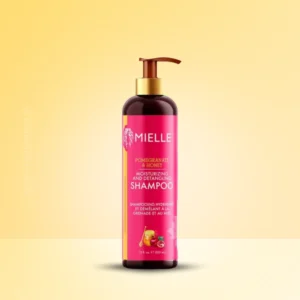 Bottle of Mielle Pomegranate Honey Detangling Shampoo 355ml for Type 4 curly hair